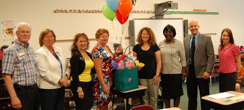 (Left to right) Jazz Woodward, Clayton Chamber Ed Committee; Sarah Martin, Clayton Chamber Ambassador Donna White, Johnston County School Board; Martha Stovall, Clayton Chamber Ambassador; Robin Hiatt, Super Star Teacher; Hattie Frederick, First Citizens Bank; Brian Johnson, Powhatan Principal; Jamie Taylor, Powhatan Asst. Principal