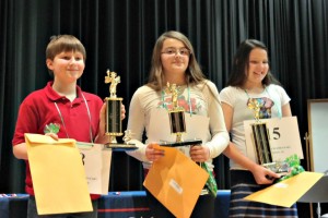 Winners of the JCS Elementary Spelling Bee. Pictured, left, 3rd place winner, Jacob Ellis (Four Oaks Elementary); 1st place winner, Ariana Arbelaez (Cooper Elementary); and 2nd place winner Whitley McCoy (Princeton Elementary). 