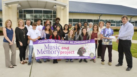 Caption: Cleveland High School Interact Club member Gabriel Roman presents a $500 check on April 15 to Rotarian Doug McClentic. On the front row (from left) are Lauren Hadley (advisor), Madison Cauley (Rotarian), Nick Loscalzo, Yesenia Pineda, Brittany Cox-Abregano, Maria Carillo, Karen Medina, Katie Skinner, Osmara Gomez, Mya Lynn, Kim Lewter (advisor), Gabriel Roman, and Doug McClentic (Rotarian). On the back row are John Long (Rotarian), Neils Sampson, Shelby Wise, Rachel Enniniya, Jessica Wesley-Shanks, Keyanna Clack, Evettra Hamilton, Ruth Anderson (Rotarian), and Sarah Martin (Rotarian).