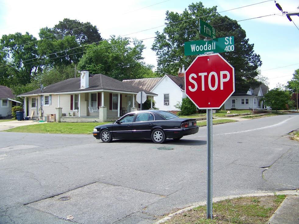 Caption: The Town of Smithfield will be adding additional stops signs at this intersection, Woodall and Fourth Street, to make it a 4-way stop. The action was taken at the request of Police Chief Mike Scott following complaints about speeding in the area.