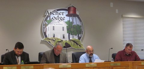 Caption: Mayor Mike Gordon and council members review the proposed 2015-2016 budget