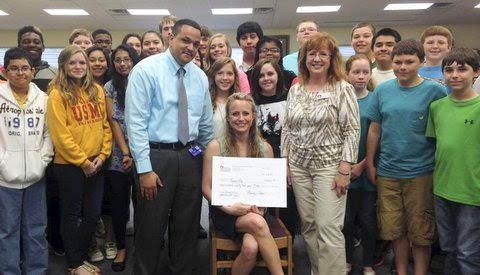 On the front row (from left) on May 21, are Principal Ron Anthony, grant recipient Magen Pike, and Johnston County Education Foundation Representative Judy Boyette. On the middle row are Eric Macias, Emmy Poole, Daphine Argandona, Heidi Perez, Gabby Godwin, Kandice Adams, Shaina Simmons, Hannah Ginn, Bryanna Konig, Hank Williams, and Marshall Blackman. On the back row are Hezikiah Bailey, Luke Wood, Christopher Surles, Tommi Butts, Estaphanie Gamez, Brandon Lushene, Maricela Chavez, Matthew Valentino, Alexander Marler, Noah Higgins, Aubry Pollard, Juan Pavon, and Austin Williams.