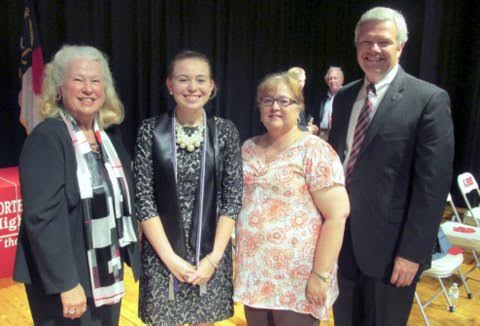 Cleveland High School senior Marina Roe (right-center) is a 2015 Joyce W. Wade Scholarship recipient. Standing with her (from left) are Joyce Wade, Kimberly Roe, and Principal Anne Meredith.