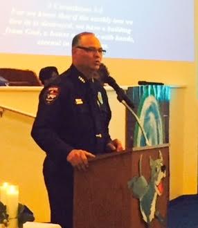 Smithfield Police Chief Michael Scott speaks during a Prayer Vigil Service Tuesday at St. Peter Church of Christ to remember the victims of the Charleston, SC church shooting.