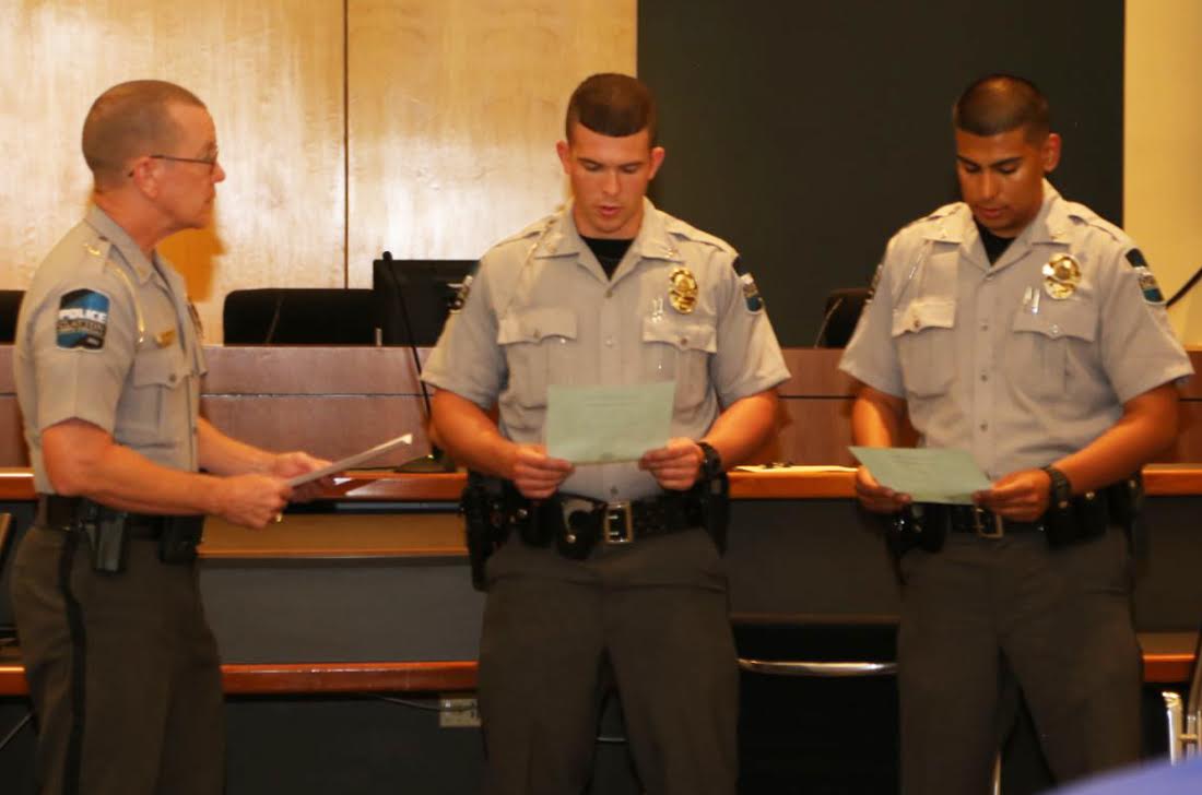 Police Chief R.W. Bridges welcomes Officers Daniel Evans and Erick Martinez to the Clayton Police force.