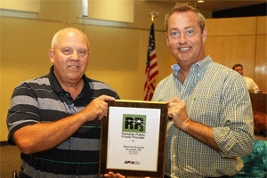 (Left to Right) Town of Clayton Electric Systems Director Dale Medlin and Clayton Mayor Jody McLeod show the American Public Power Association RP3 Gold Award plaque recently received.