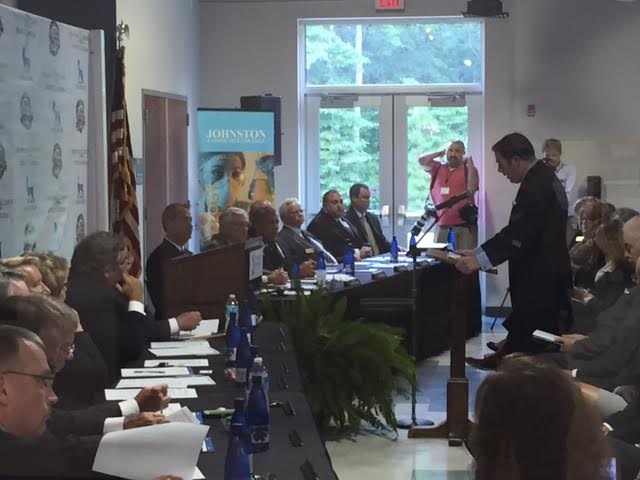 Johnston County Economic Development Director Chris Johnson addresses the Johnston County Board of Commissioners and members of the Clayton Town Council. Photo by John Payne