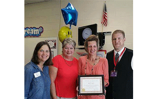 (From Left): Kay Surles, Four Oaks American Legion Auxiliary; Donna Moore, Four Oaks Elementary Assistant Principal; Holly Nord, Award Recipient; and Michael Avery, Four Oaks Elementary Assistant Principal.
