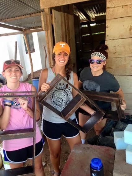 Selma Elementary teachers Katie Strickland, Dani Yarborough, and Heidi Meyer help make bricks for women housing in Granada, Nicaragua on July 20.
