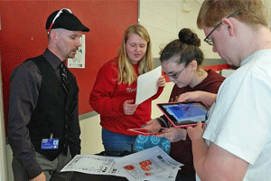 Exploring augmented reality with the Quiver app (from left) are Digital Learning Team member Jamie Lanier and North Johnston High School students Leanne Meserve, Ericka Allen, and Ben Meserve.