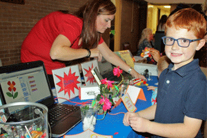 Cleveland Elementary third grader Preston Sharp (right) explores STEM resources with teacher Natalie Hulbert.