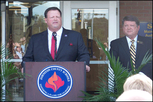 (Left to right) Dr. Ross Renfrow addresses a crowd of about 100 people during a press conference Monday afternoon at Smithfield Selma High. Renfrow will replace retiring superintendent Dr. Ed Croom on March 1st, 2016. School Board Chairman Larry Strickland looks on. WTSB Photo