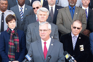 Sheriff Steve Bizzell speaks during a press conference Friday on the steps of the Johnston County Courthouse announcing the culmination of Operation Home For the Holidays? WTSB Photo