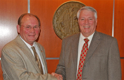 (Left to right) Harnett County Sheriff Larry Rollins resigned suddenly on Monday. He has been replaced by Major Wayne Coates who was sworn in Tuesday afternoon. Photo courtesy The Daily Record