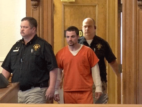 Gerald Thomas Paul Jr., 21, of Erwin is lead into a Johnston County Courtroom in March following his arrest for a double homicide in southern Johnston County. An autopsy report release this week on victim Matthew Jones indicated two firearms were used to shoot and kill him. The autopsy report on the second victim Jessica Pyatte has not been released. Photo by John Payne