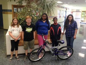 Students who won new bicycles for showing growth and proficiency on their end of grade tests this month (from left) are Shyann Spencer, Luke Woodall, Janashia O’Neal, Deion Wright, Karelli Bojorquez-Armenta. Bicycle winners who are not pictures are Julius Jones, Jade Hernandez Navarro, Sergio Parejo, and Michell Terran-Herrara.