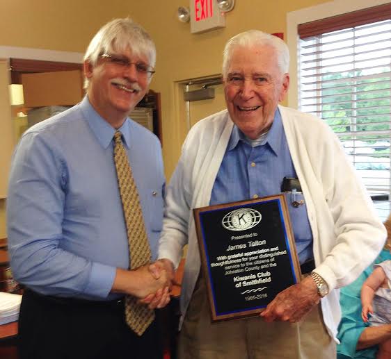  (Left to right) Dr. Gary Hosey, Smithfield Kiwanis Club President, presents James Talton a 50 year of service recognition plaque and pin.