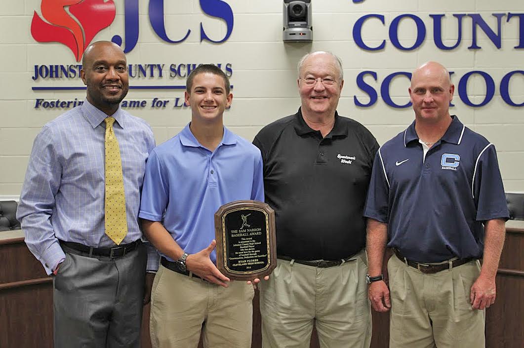 Cleveland High senior Ryan Flores (second from left) accepts the 2016 Sam Narron Baseball Award. Standing with him (from left) are Cleveland High Principal Kendrick Byrd, Rooster Narron and Coach Jamie Lee.