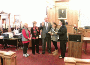 Mike Wooten of Princeton receives his Oath of Office to the Johnston County School Board from Clerk of Court Michelle Ball. Wooten won his third term on the school board in November. JoCoReport.com Photo